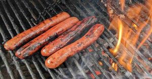 Young adults can quickly and easily grill hot dogs if they have a grill or bbq